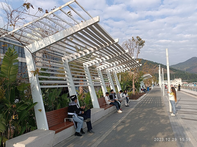 Photo of the river-walk seating area beside the river